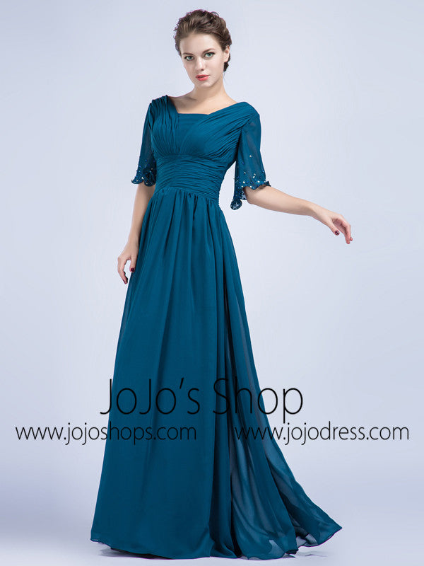 Teal gown with outlet sleeves